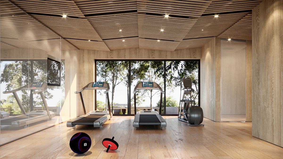 Phòng gym ốp gỗ hiện đại với cửa kính nhìn ra vườn cây
